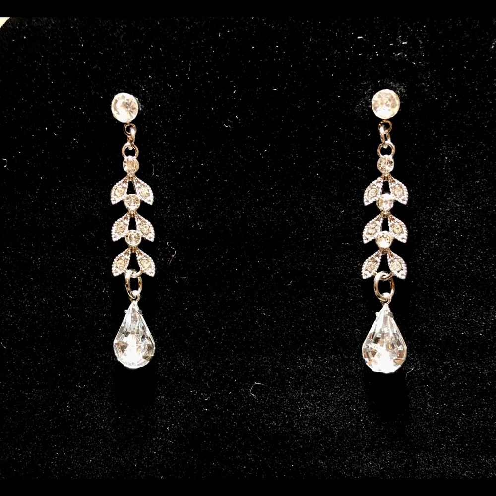 Gorgeous rhinestone dangle chandelier leaf earrings. Bridal, formal, prom